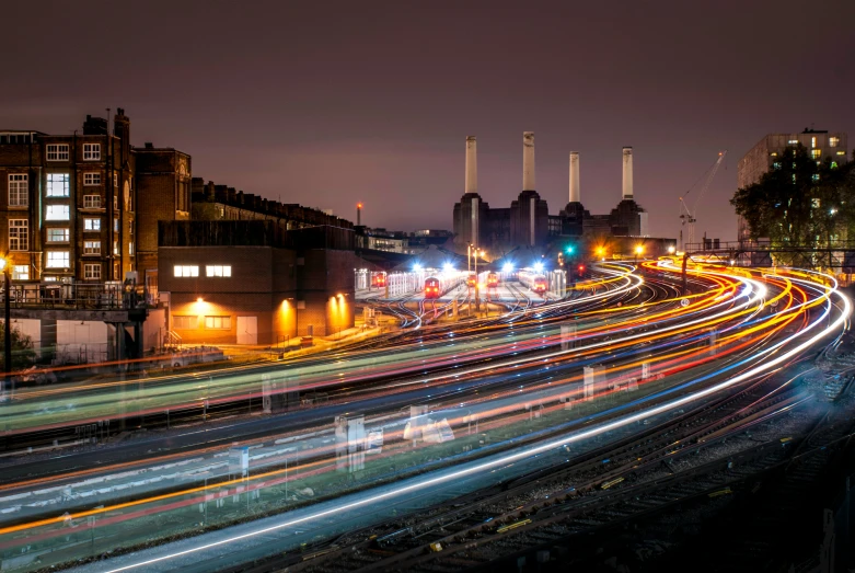 the street is filled with blurry images of traffic