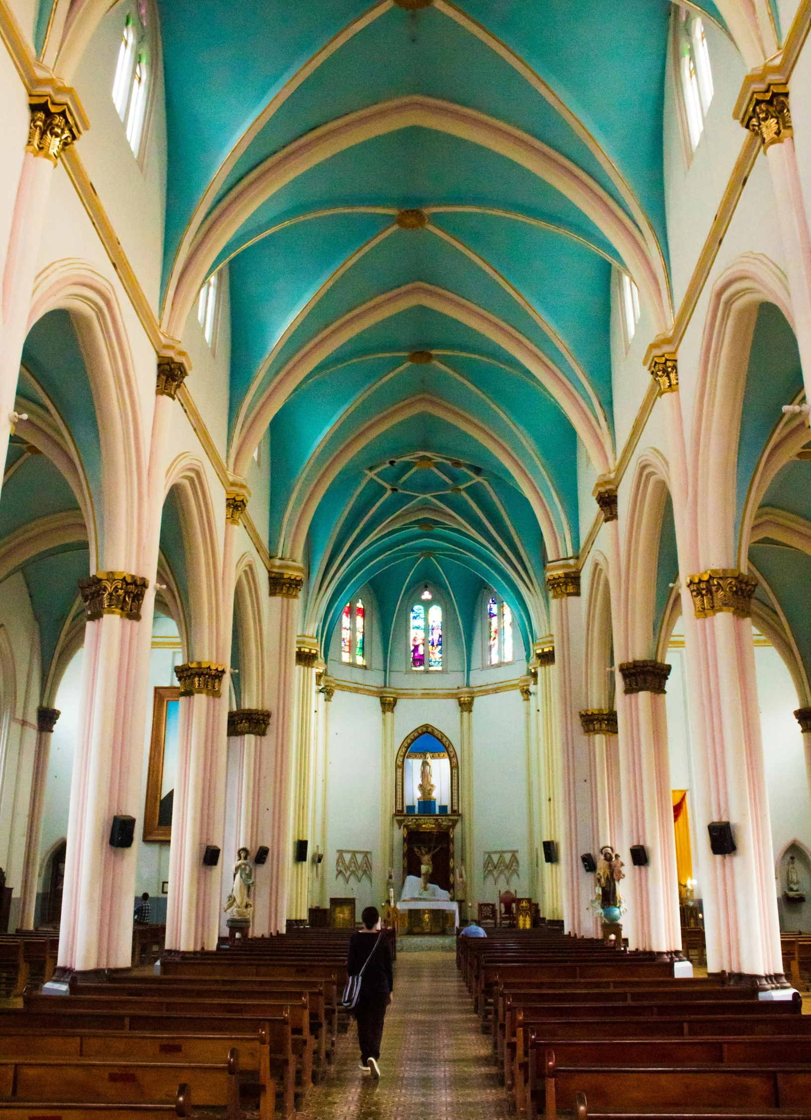 a church is shown with rows of pews