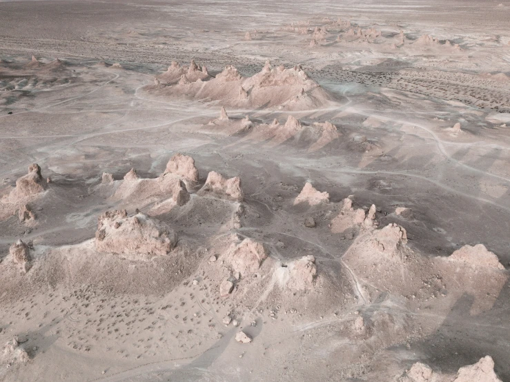 there are rocks and boulders all around the desert