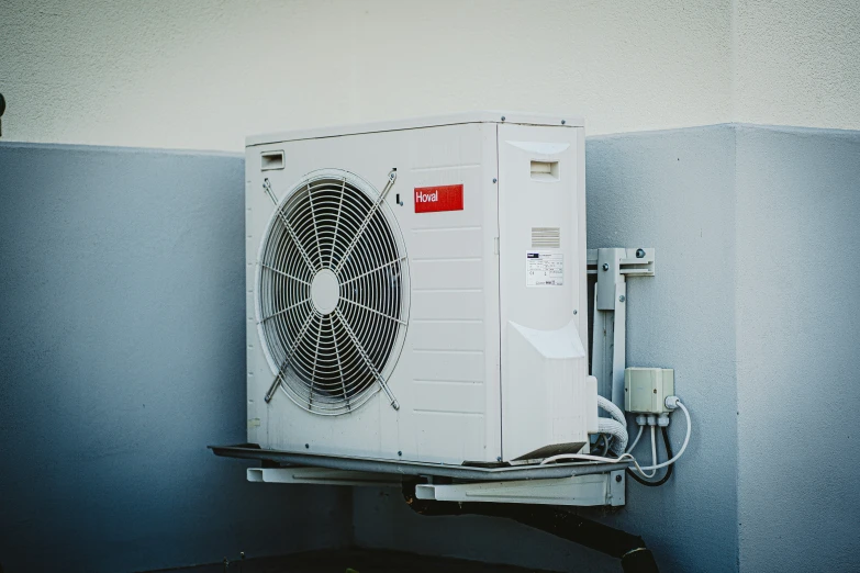 an air conditioner that is hanging from the wall