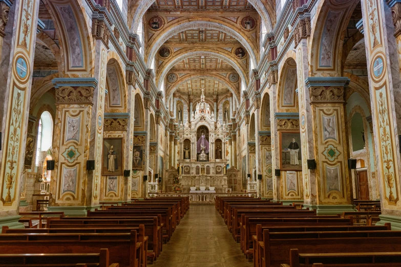 a cathedral with stained glass windows and ornate architecture