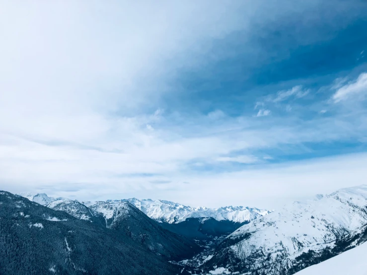 a person snow skiing on a mountain top