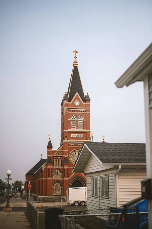 a small church is on a steeple