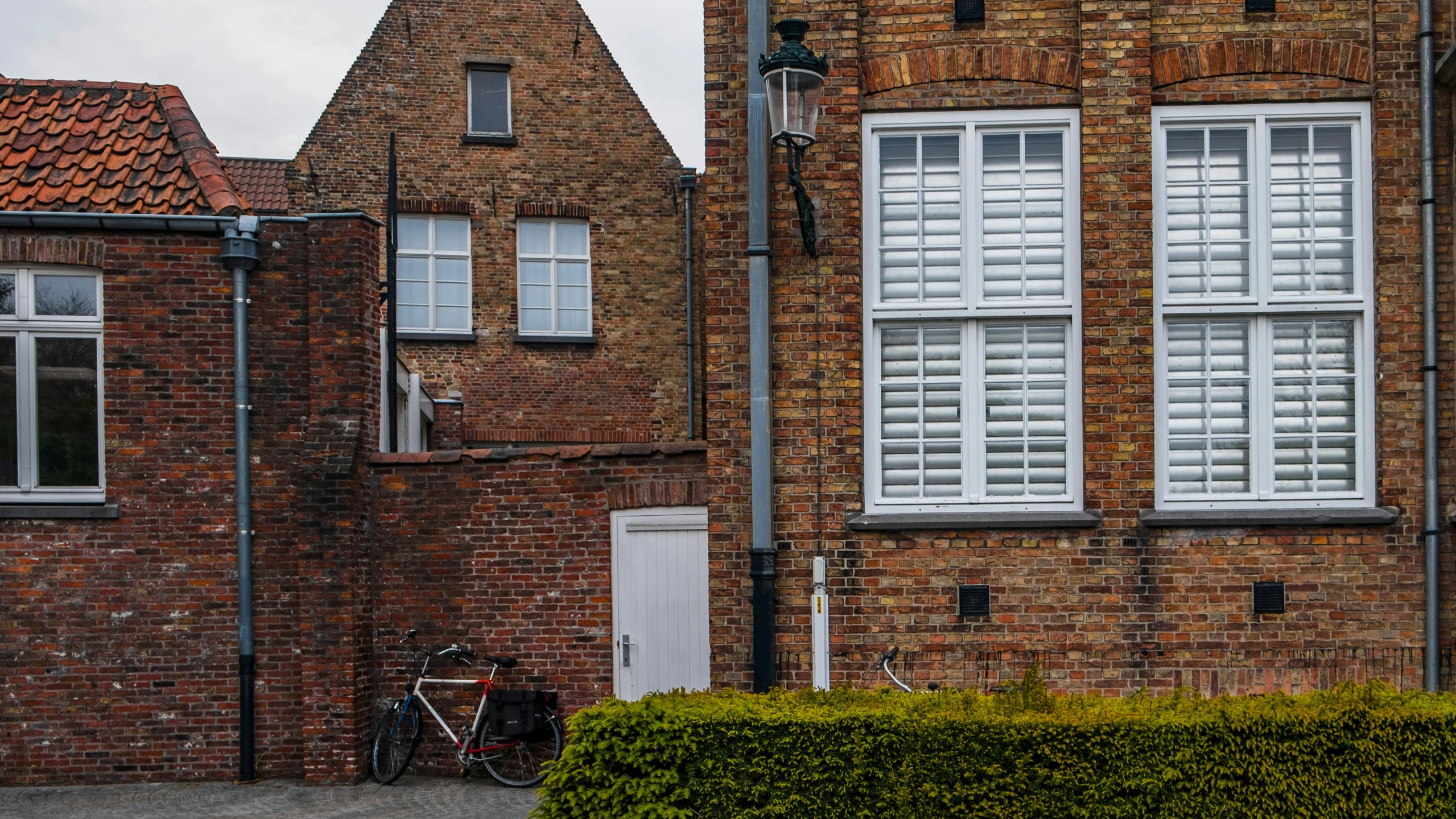 an image of a bicycle parked on the side of the street