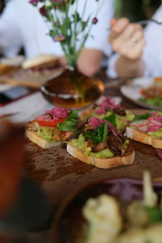 the table is covered with different types of appetizers