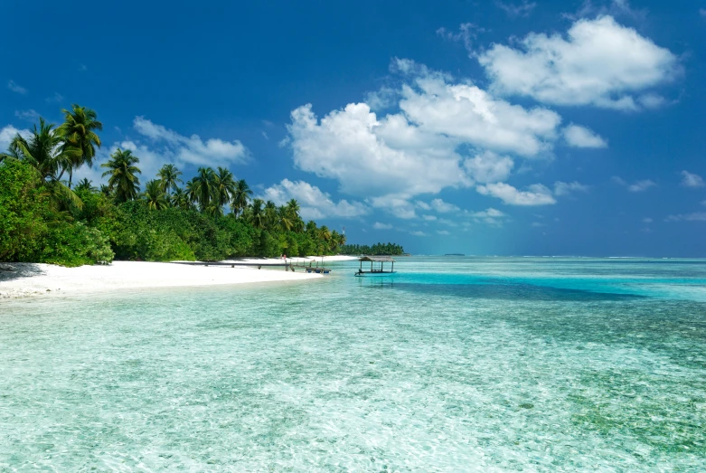 a beautiful beach is shown on the water