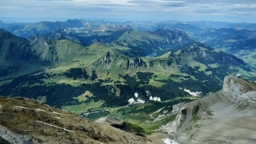 a mountain range with mountains in the background