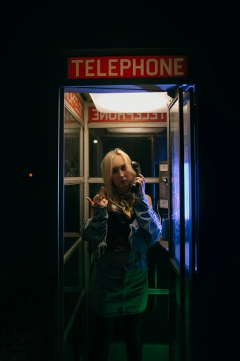 a woman with blonde hair talking on her cellphone