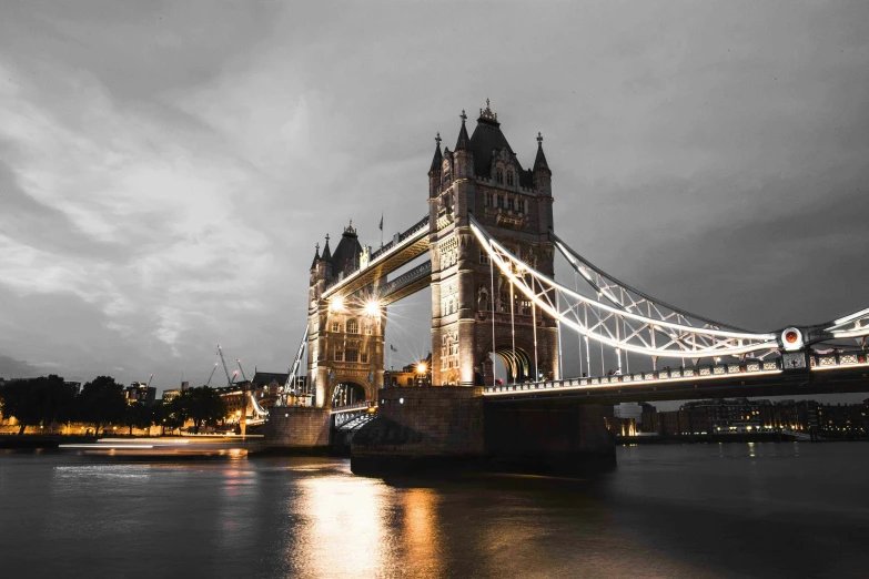 a picture of london england tower bridge over thames at night