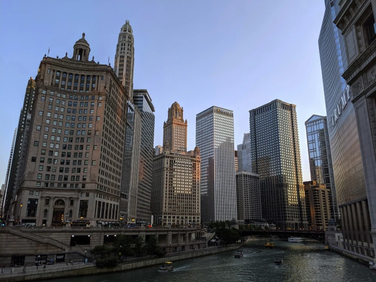 a river with some tall buildings on it