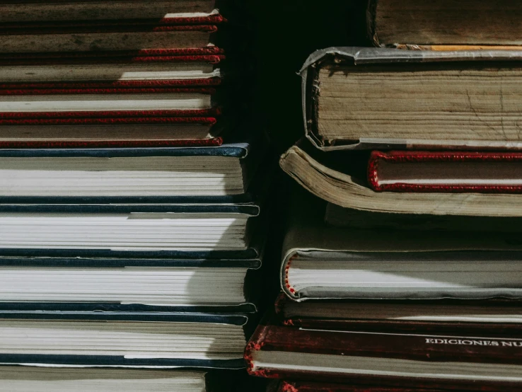 a stack of different books next to each other