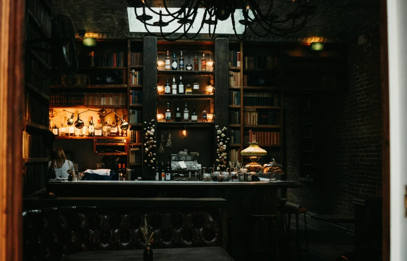 a dark and dimly lit bar in a dimly lit room