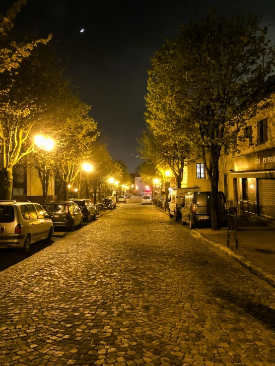 a street scene with focus on the car parked on the side