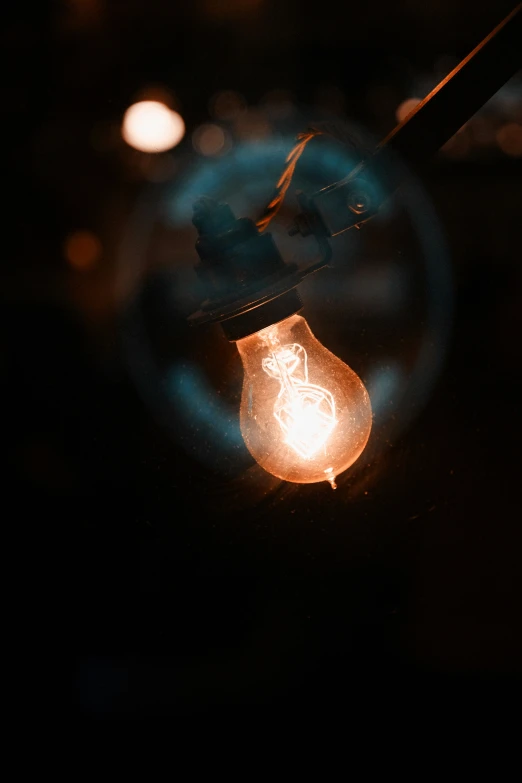 a light bulb seen through a magnifying glass