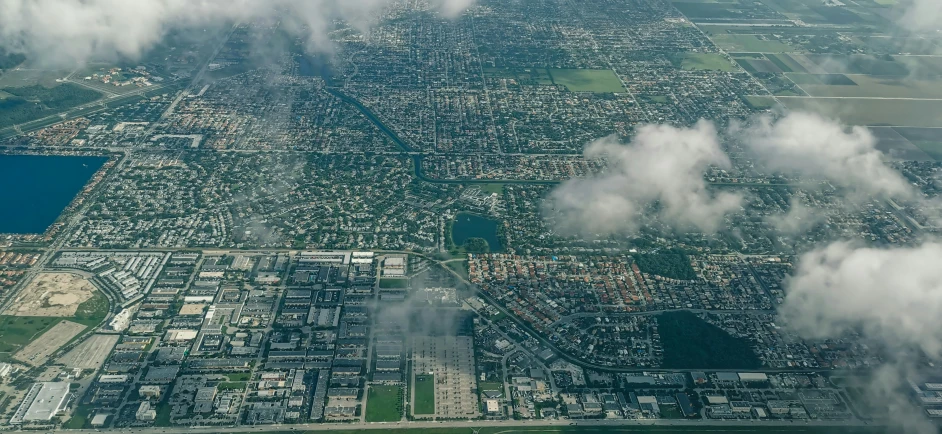 a large area of land with many houses and trees in it