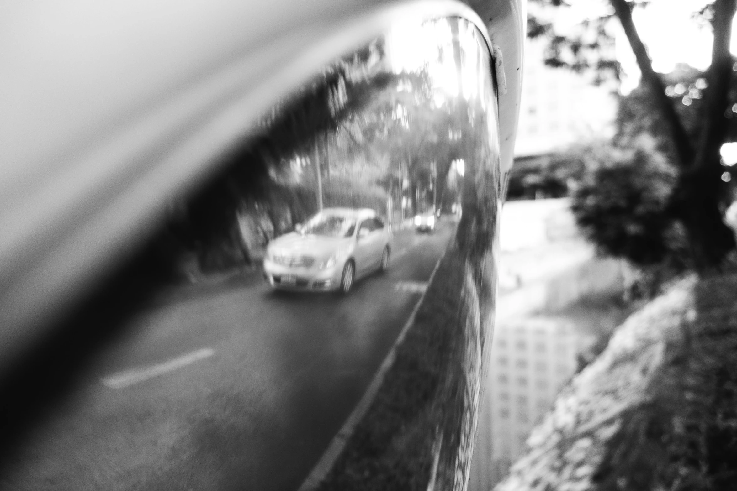 some cars are stopped on a road at night