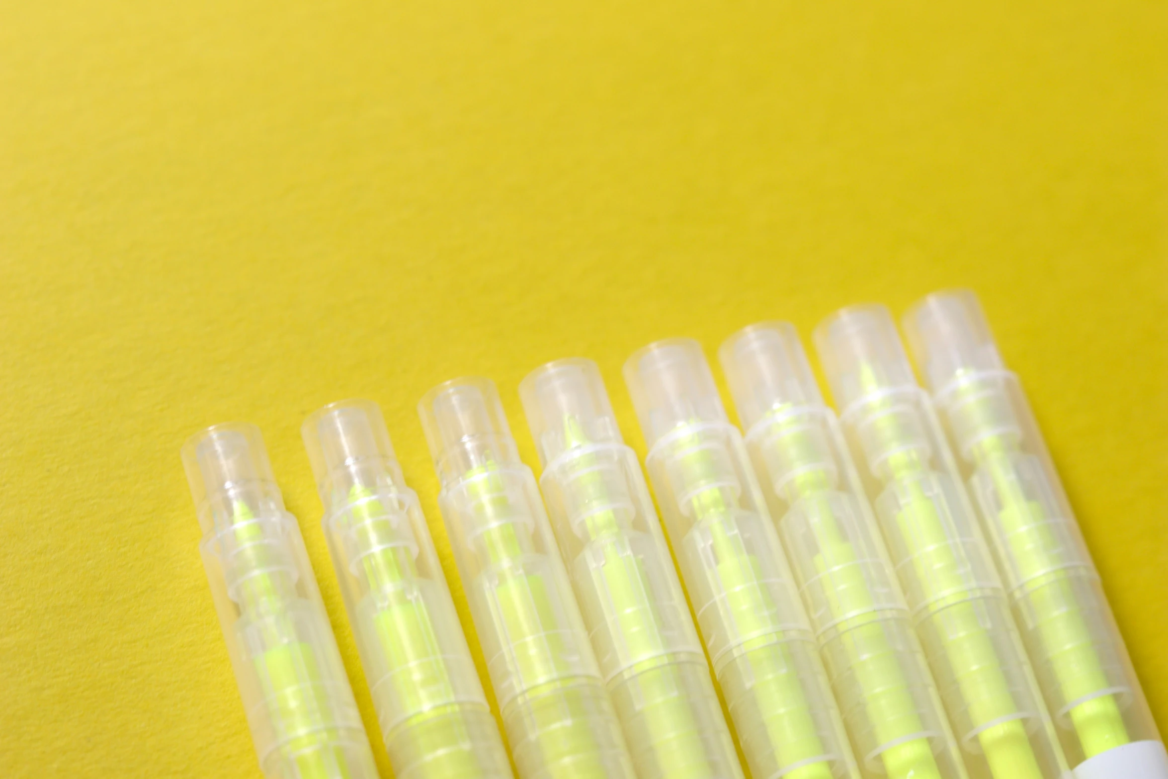 seven pens are in each container, and all have green pens