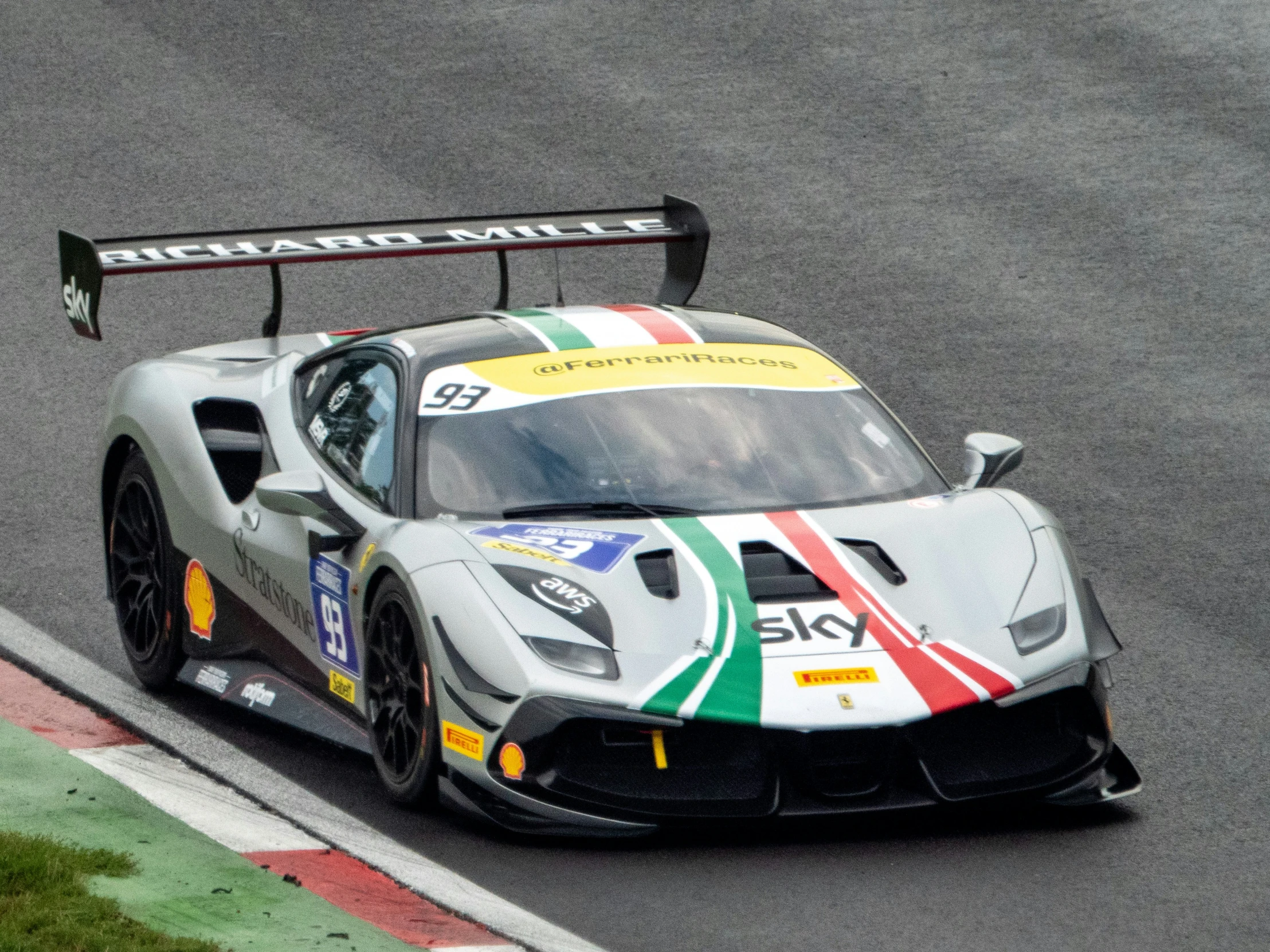 a racing car driving down the track during a race