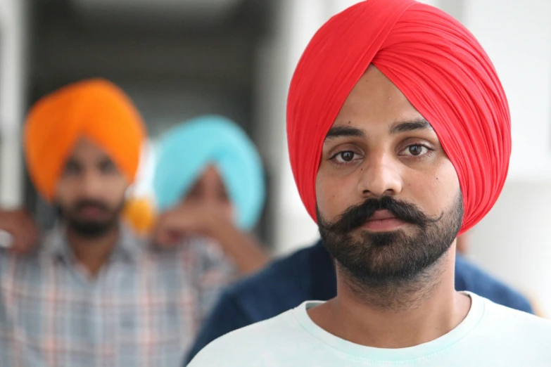 man with turban looking at the camera