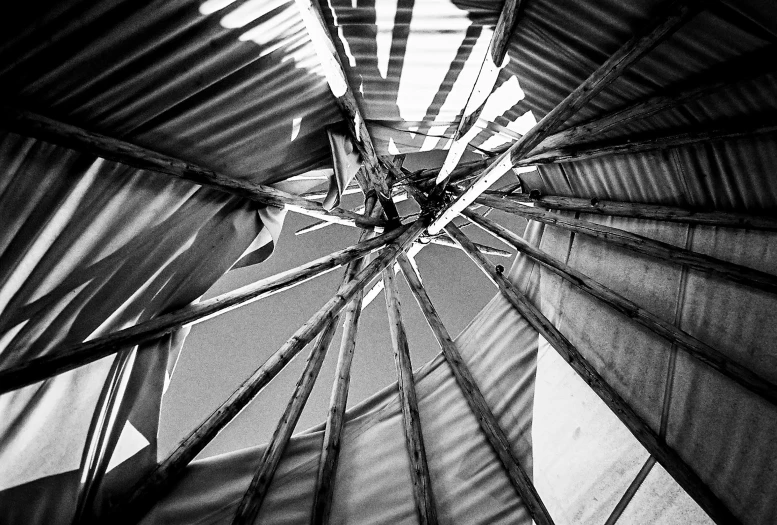 the view from underneath a large metal structure