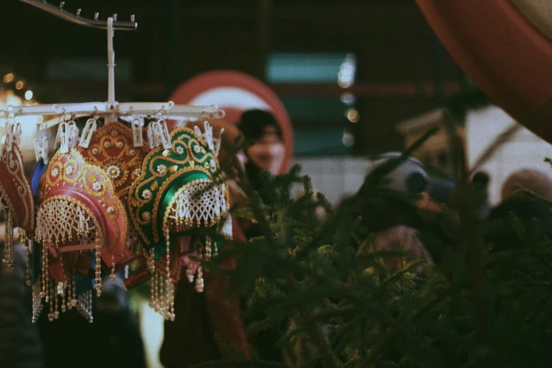 two brightly colored decoratively decorated items on display