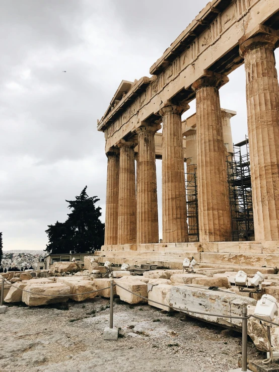 part of the ancient architecture of parthenon on a cloudy day