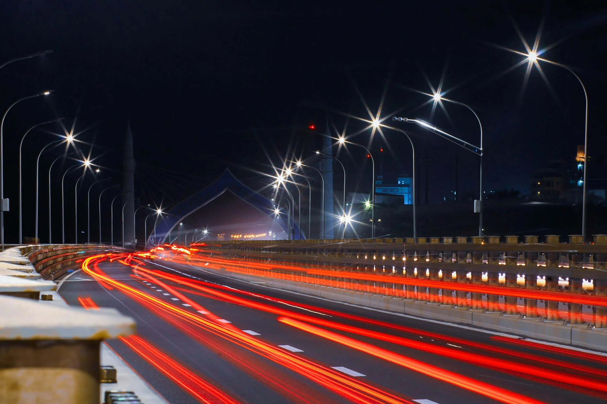 this is an image of a city street at night