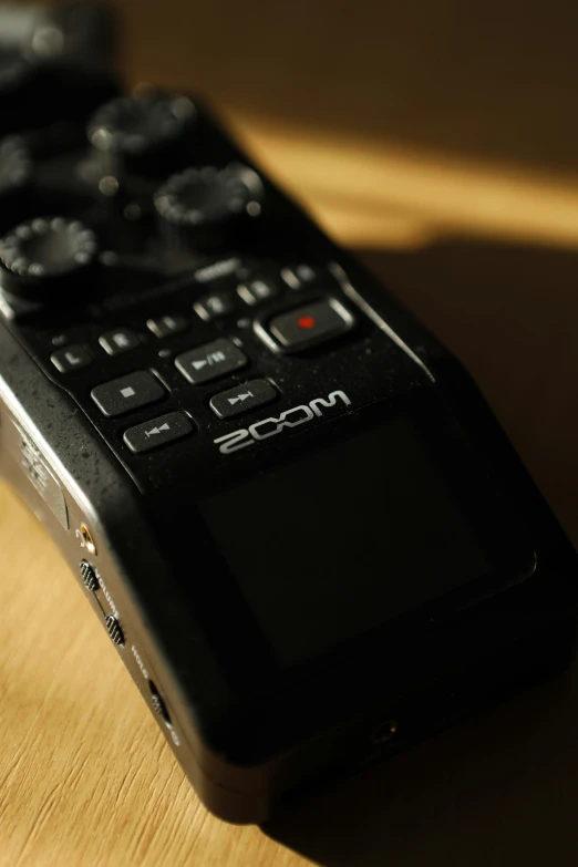 a remote control sitting on top of a table