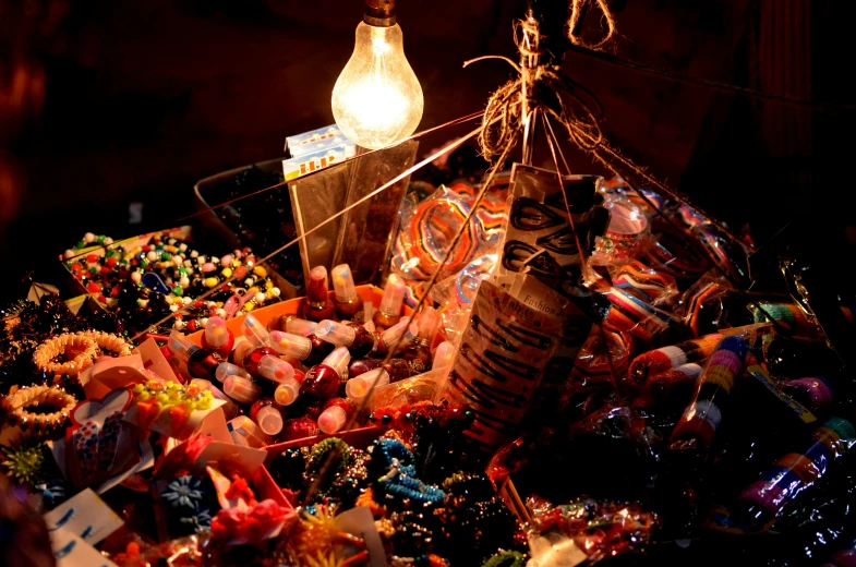 many different kinds of candies are being sold by the vendor