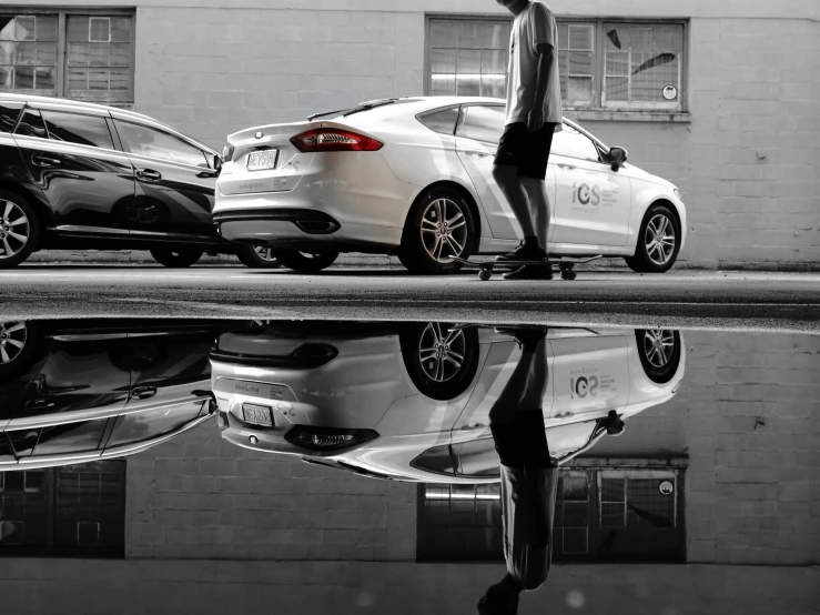 woman walking down a street with cars on it