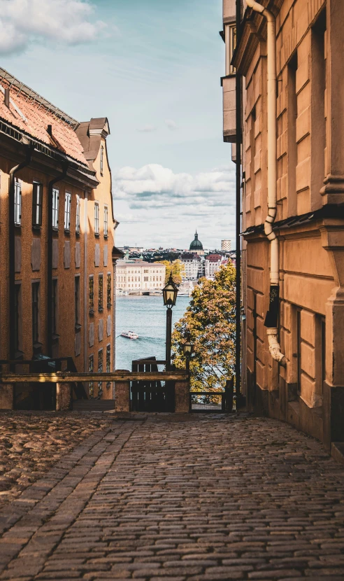 a street that leads into another with buildings on either side