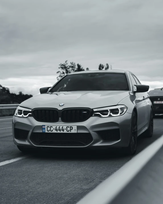 the new bmw m4 competition in motion on the road