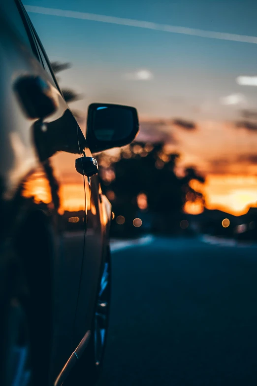 a car is shown parked on the side of the road