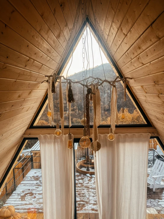 curtains hanging from a raft are hanging in the winter