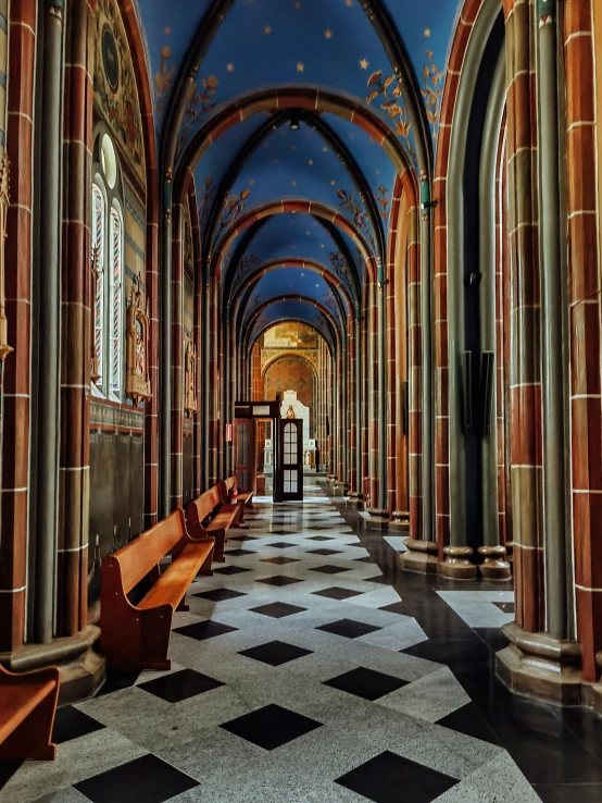 there are many benches along this hallway together