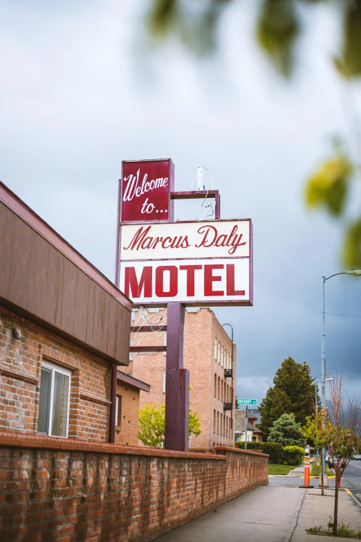 the sign for the motel in the neighborhood