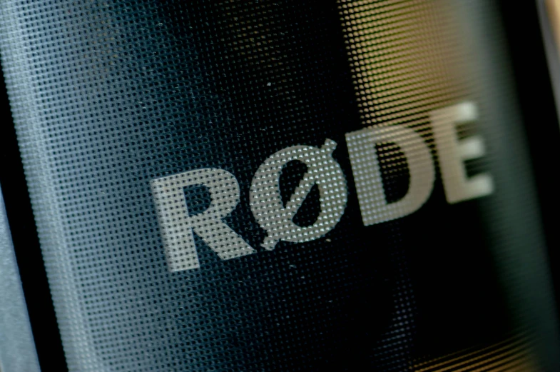 the rodd logo is printed on a dark metal plate