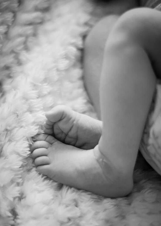 a closeup view of a small baby foot