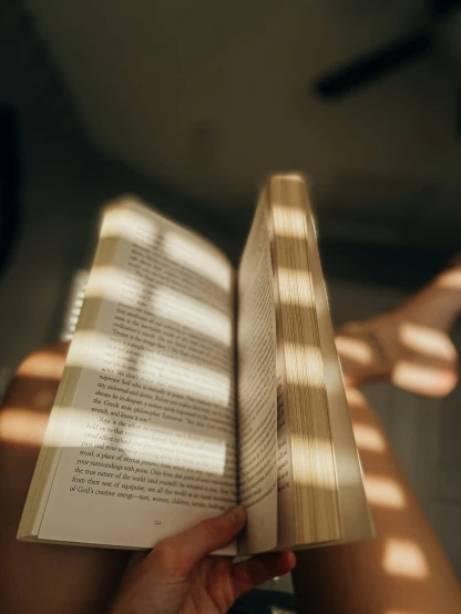 a book that is open in a room