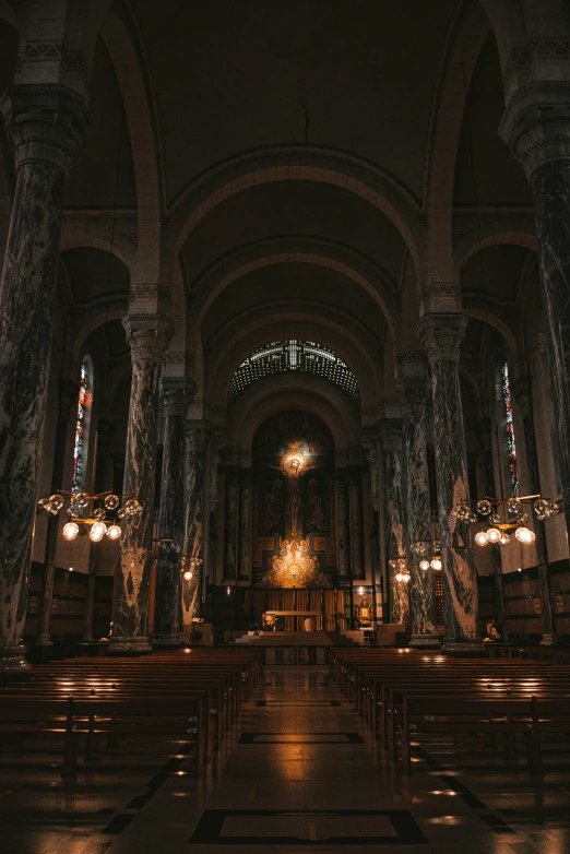the interior of a church with light shining down