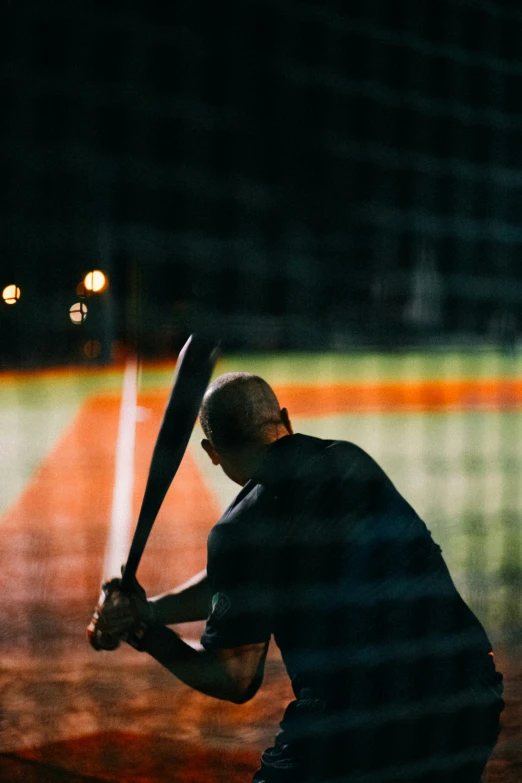 a man is preparing to hit a ball on the field
