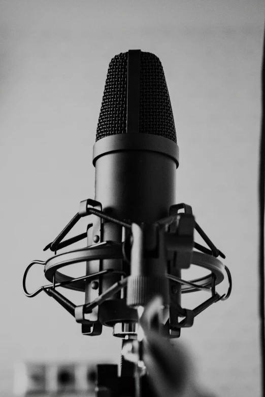 a microphone, which has four legs with wires in the center