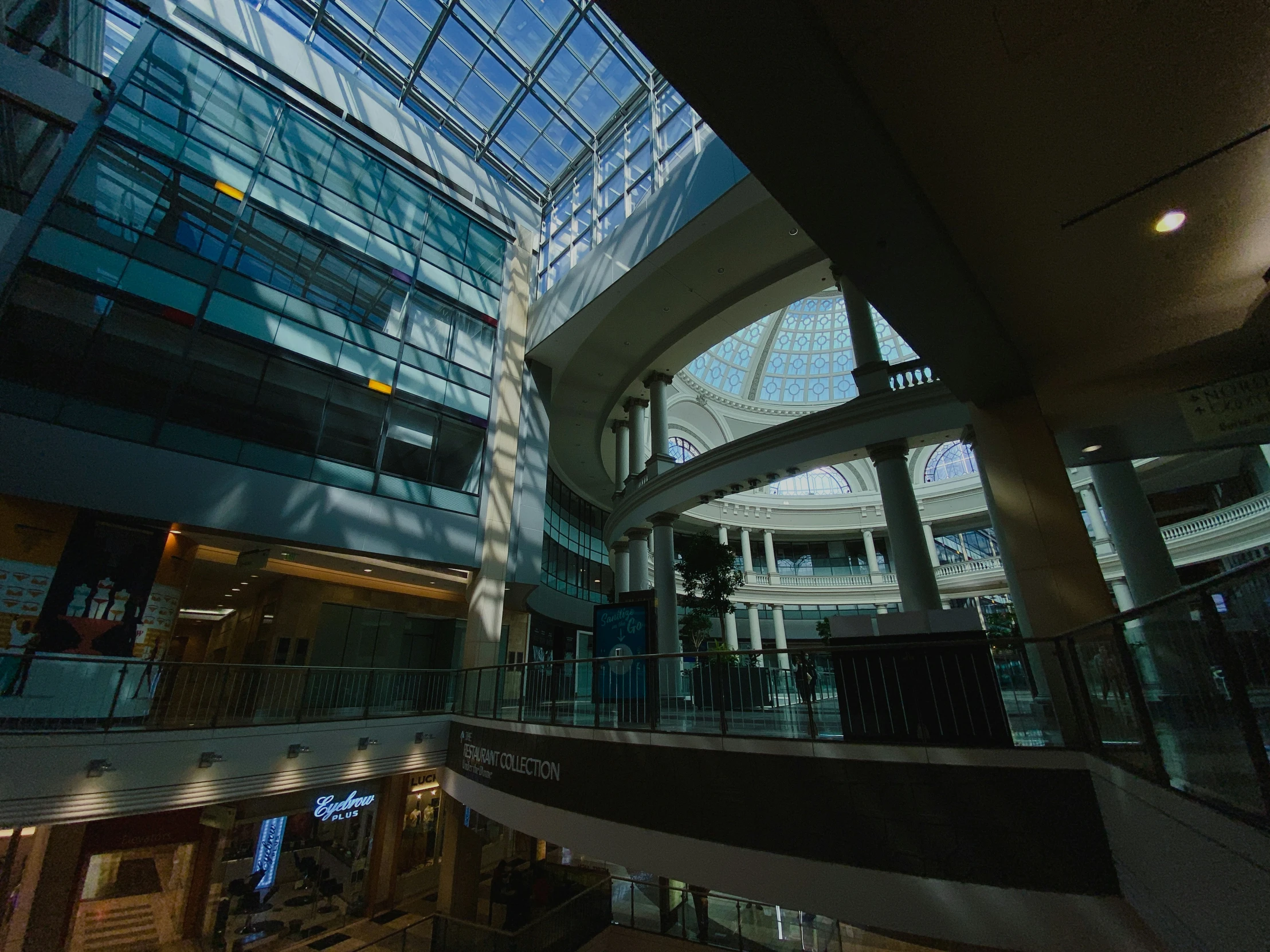 a group of people standing inside of a building