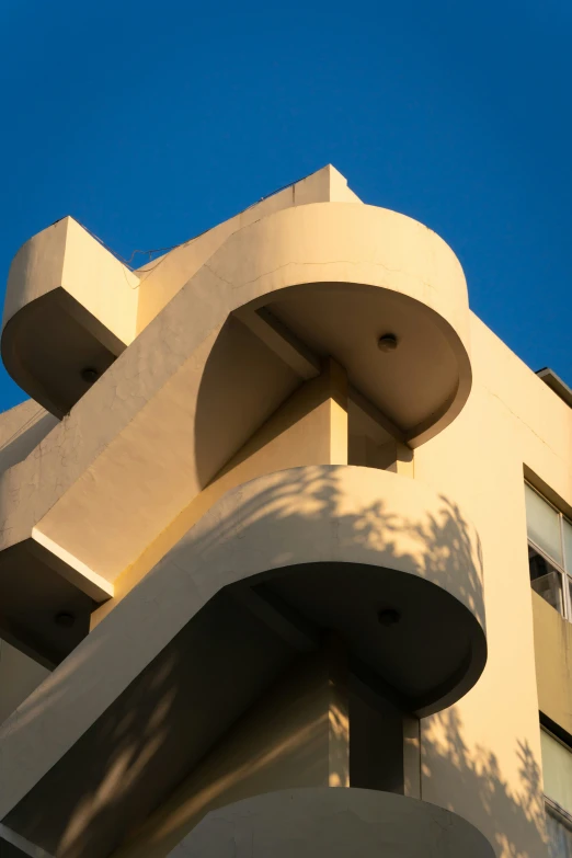 a clock is displayed on the side of the building