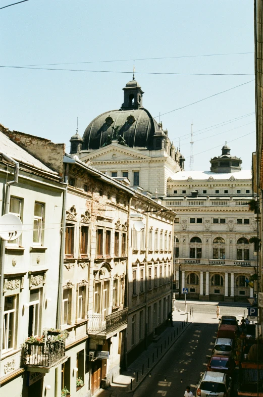 a view of a large building and some cars