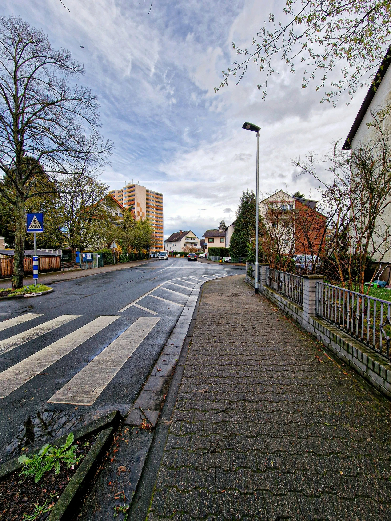 a deserted city street is seen in the distance