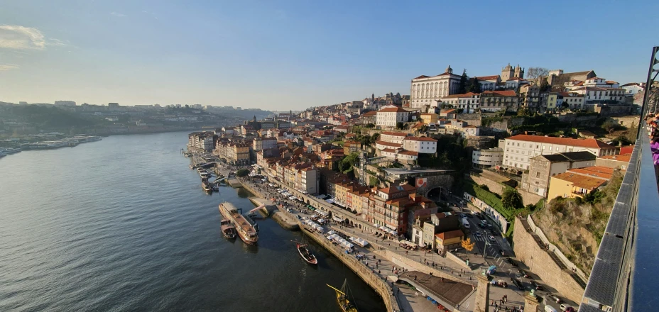 a city and a bridge next to the river