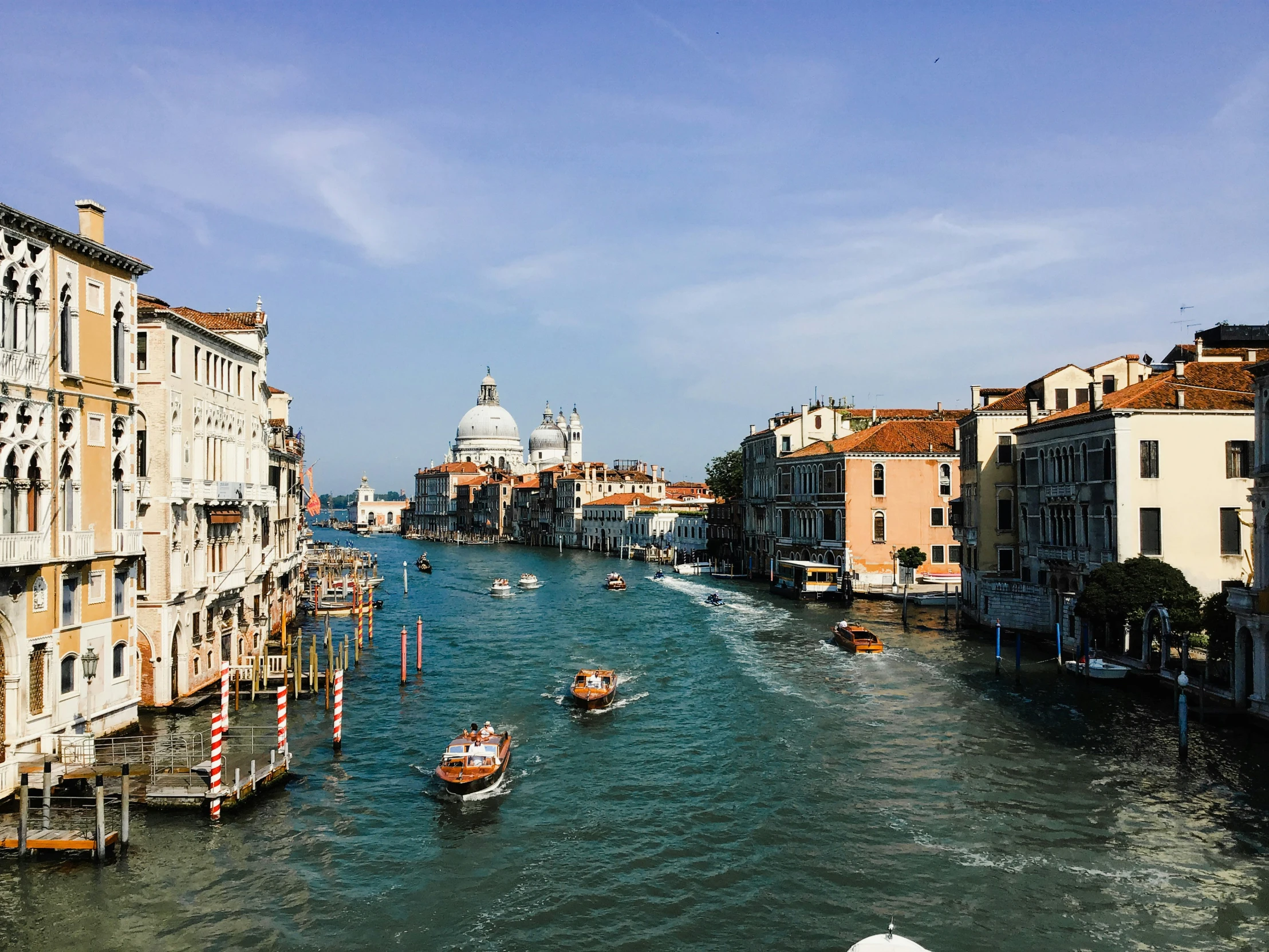 a view of a canal filled with water and buildings