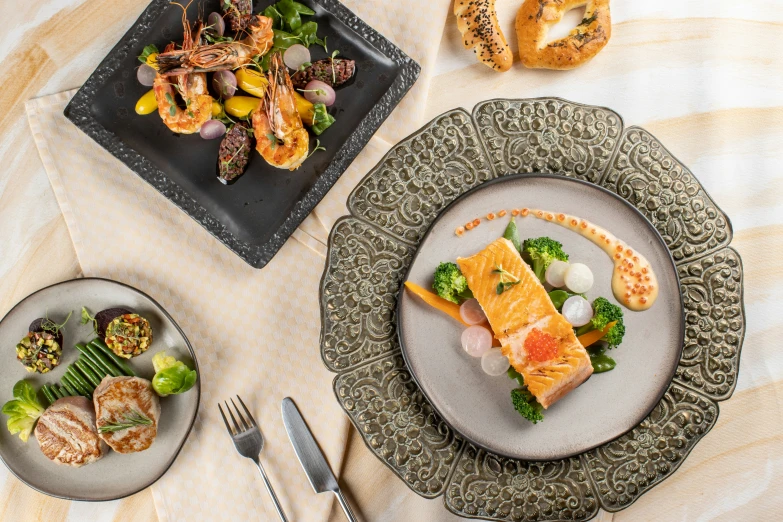 a couple of plates of food on top of a table