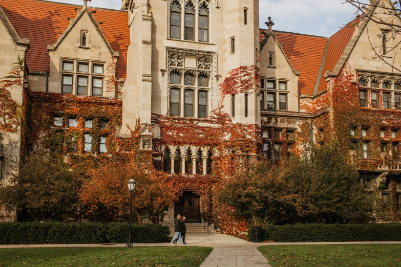 a big building that has red roof and windows